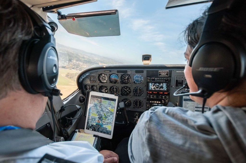 Student pilot training in cockpit, relevant to F-1 CPT OPT work authorization for international pilots