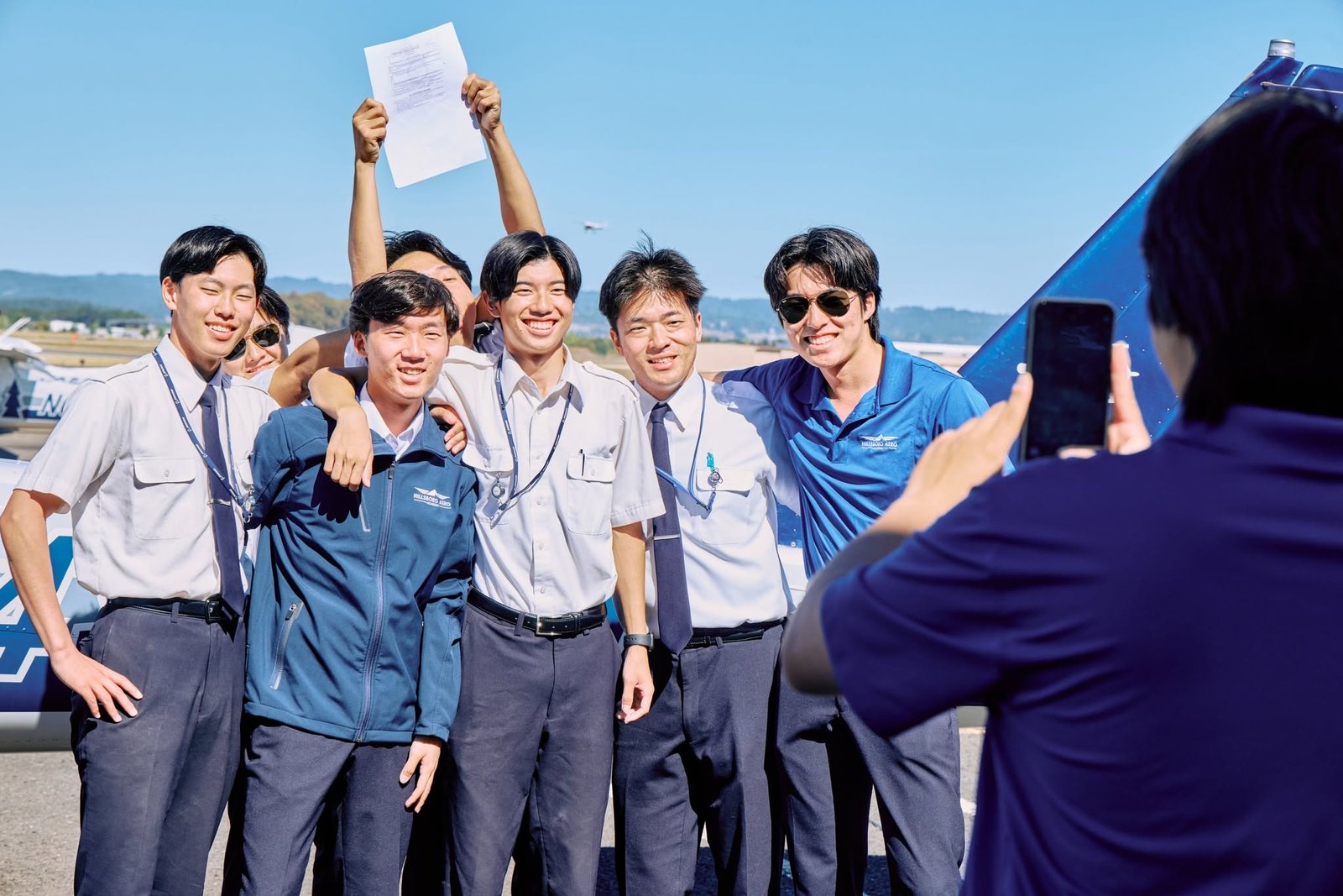 HAA student pilots celebrating — international pilot students on F-1 visa training in the US